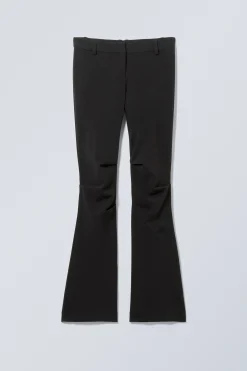 Weekday SLIM LOW WAIST FLARED PLEATED TROUSERS><noscript><img width=